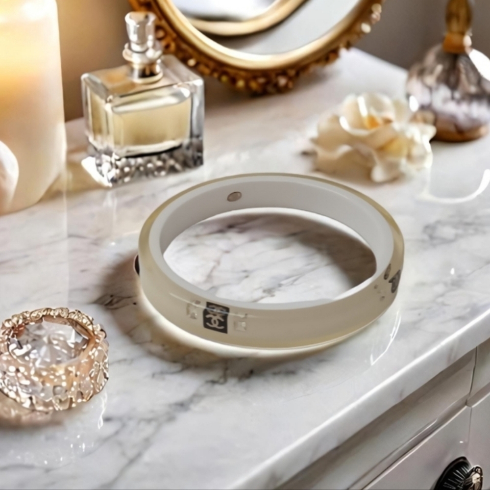 CHANEL ✨️CC Logo Bangle Bracelet In Clear & White Resin with rhinestones